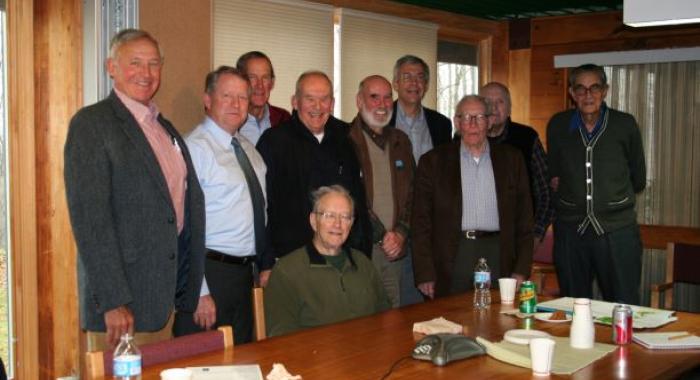Members of the President's Foresters Council gather for a photo in the conference room at the Forest Society.