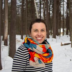 Woman in striped shirt and scarf