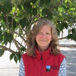 Meredith Reed O'Donnell poses in front of a tree.