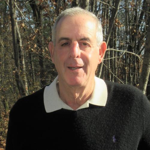 George Epstein poses outside the Conservation Center.