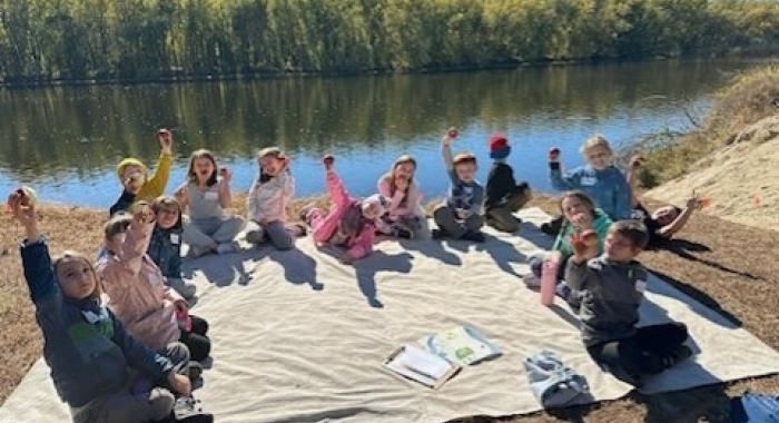 a "Project SEE" outdoor classroom along Merrimack River