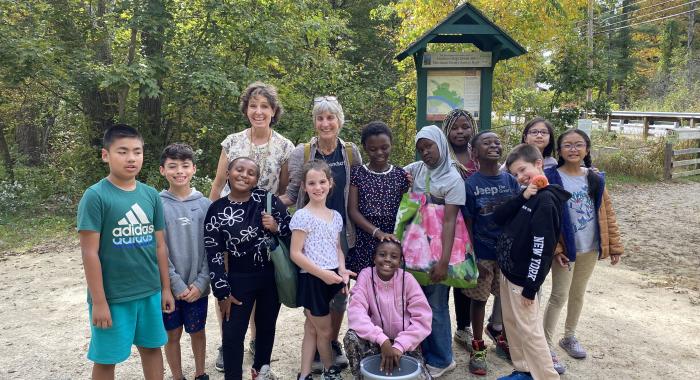 Local students pose at Merrimack River Floodplain trailhead