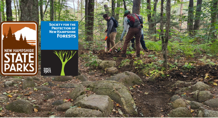3 people with tools on a trail moving sediment from drainage feature.