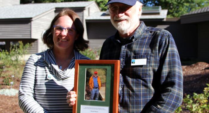 Dave Heuss and Carrie Deegan pose together with Dave's award.