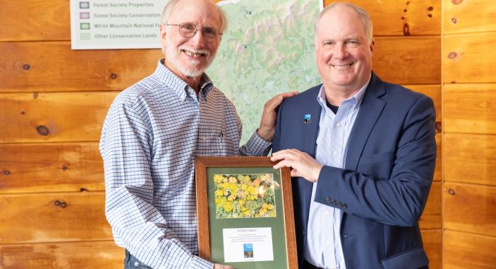 Ken Stern and Jack Savage pose at the closing at the Conservation Center.