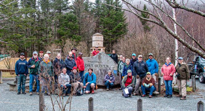 Volunteers and staff pose after a cleanup at Lost River.