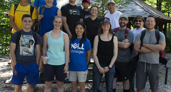 A group of volunteers poses together at Monadnock State Park.