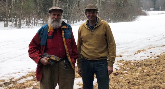 Dorn and Chuck Cox pose in front a snow covered field at Tuckaway Farm.