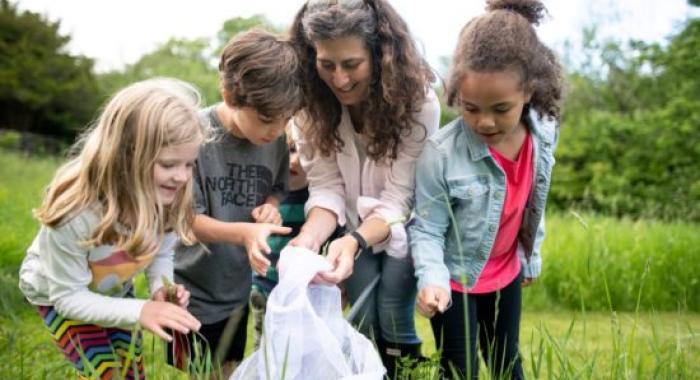 Susie Spikol in nature with little kids.