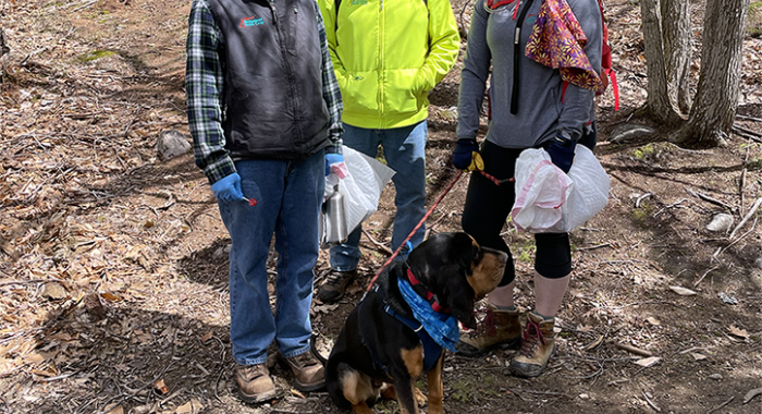 A team from NH Electric Cooperative stops on the trail for a photo.