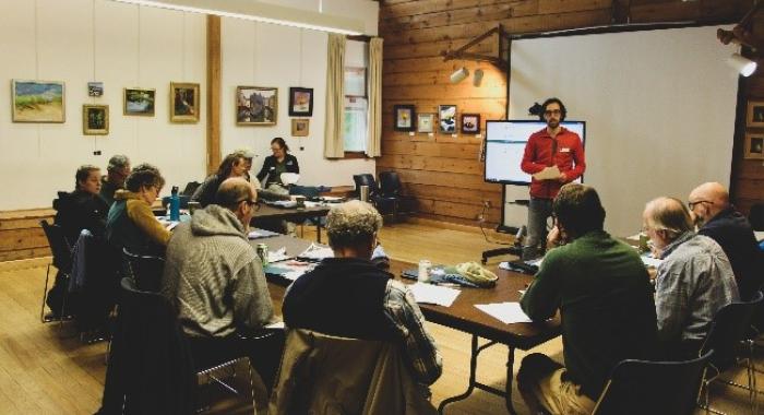 staff training volunteers around conference table