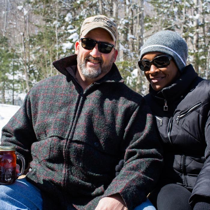 A couple poses together during the tractor ride.