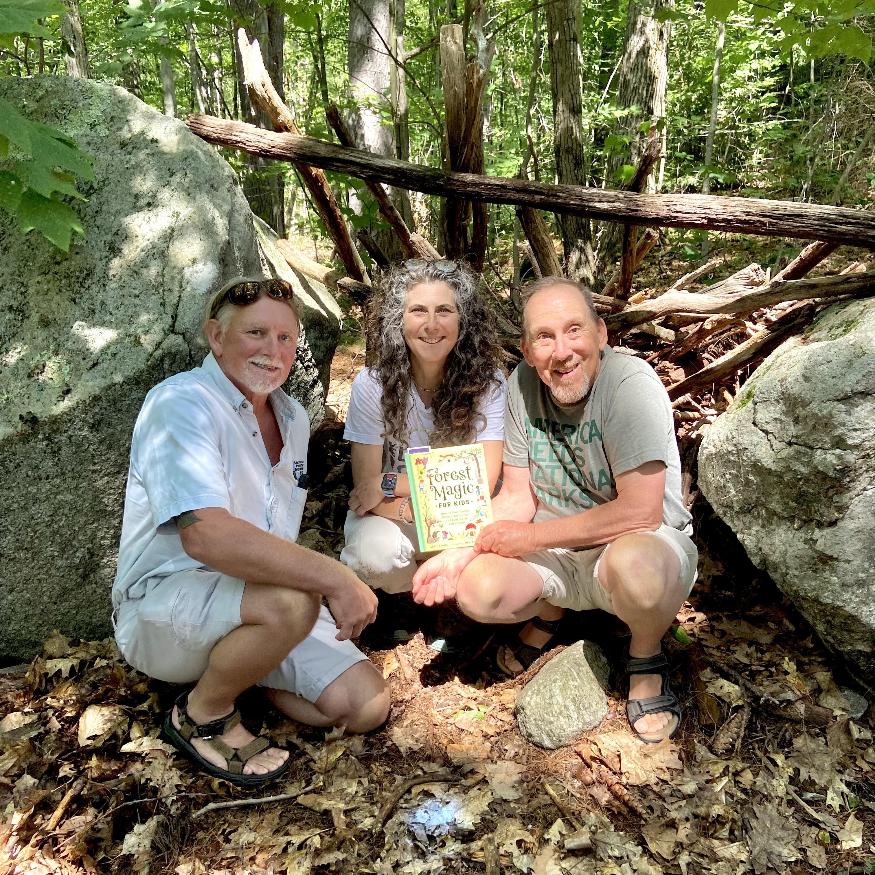 Dave Anderson, Susie Spikol and Chris Martin share a fairy structure.