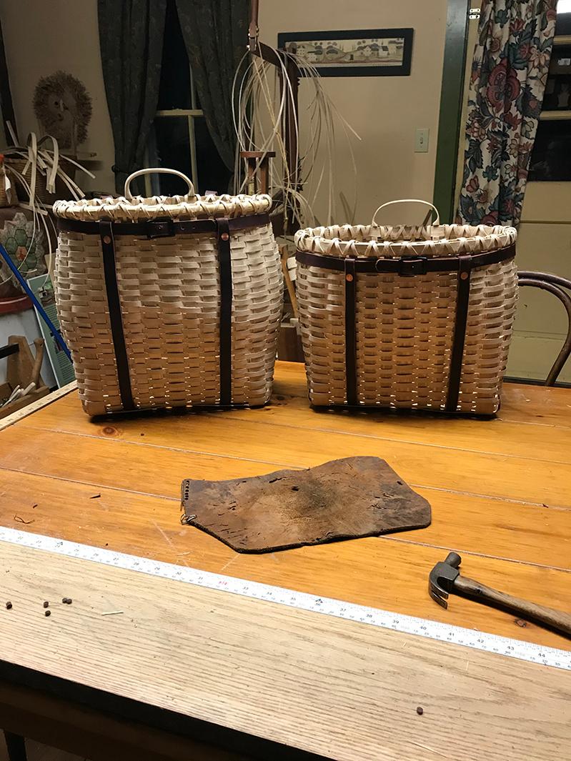 Baskets sit on a shelf.