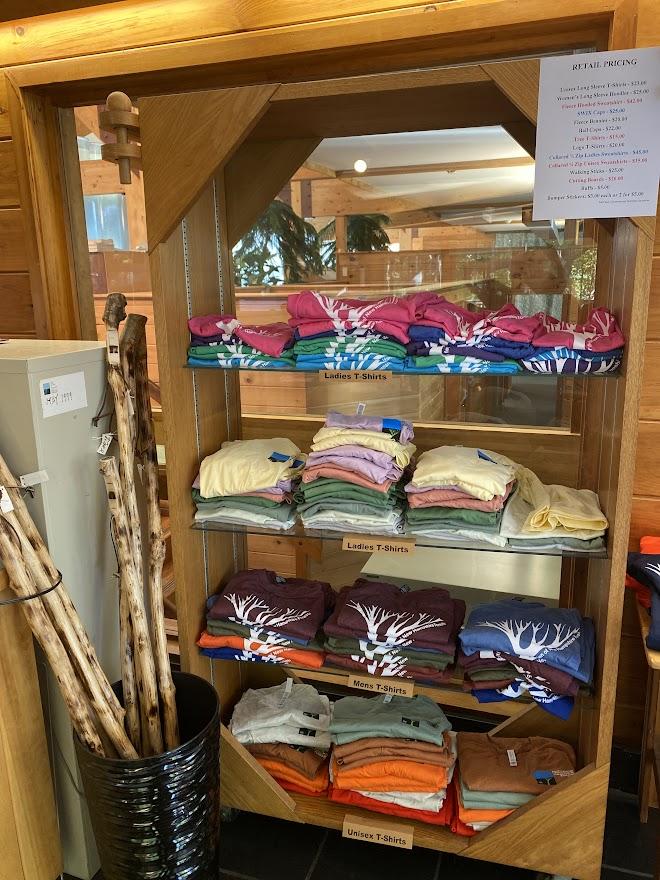 Walking sticks and tshirts are for sale.