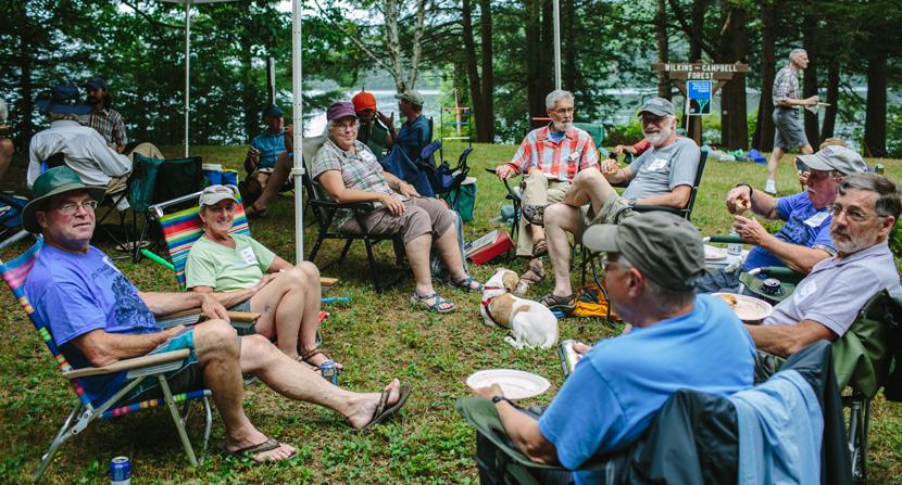 Good company and good food at the land steward 25th celebration at Wilkins-Campbell Forest in Deering