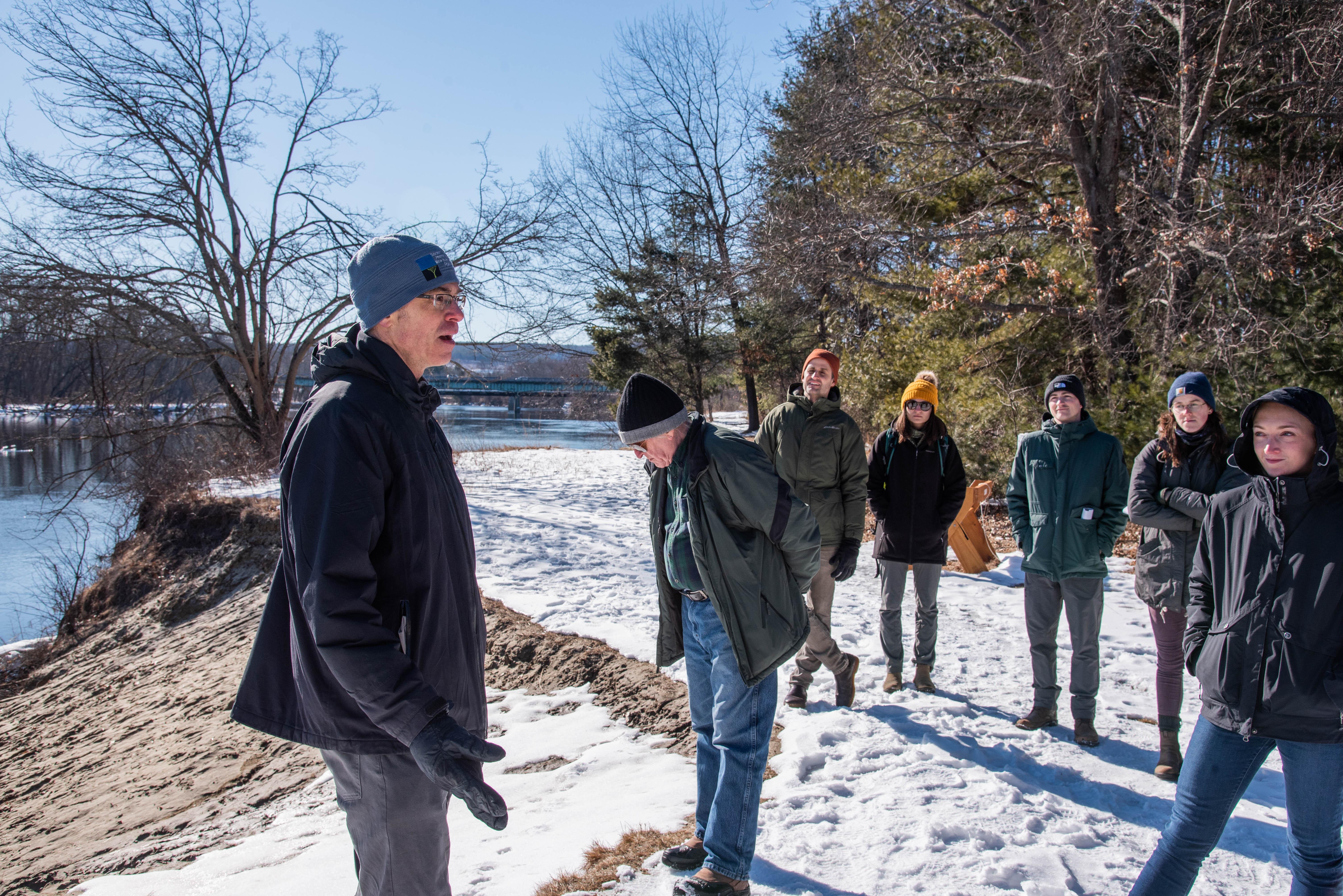 Forest Society staff speak to students along Merrimack Riverbank