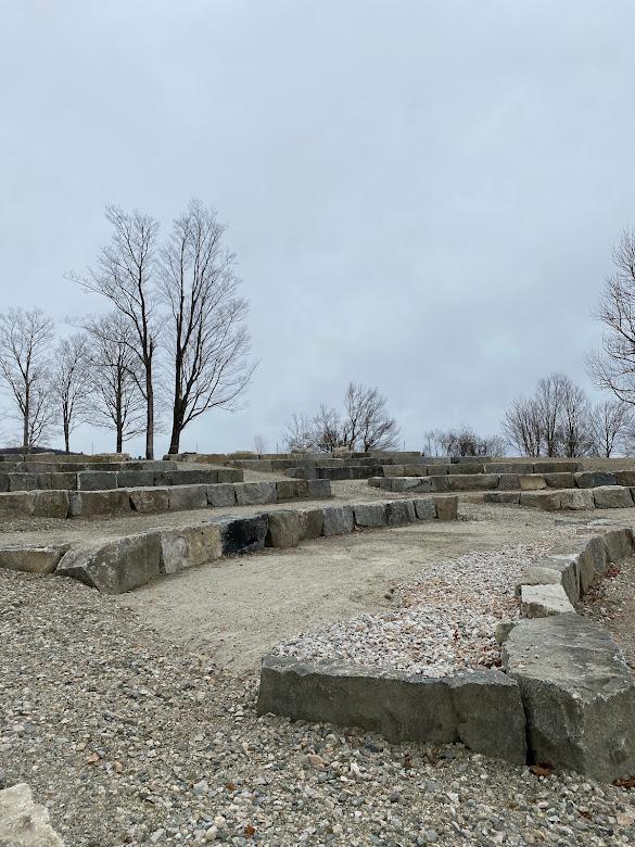 Rocks from the foundation of the former Tool Building were repurposed into an outdoor amphitheater at The Rocks with spectacular views. 