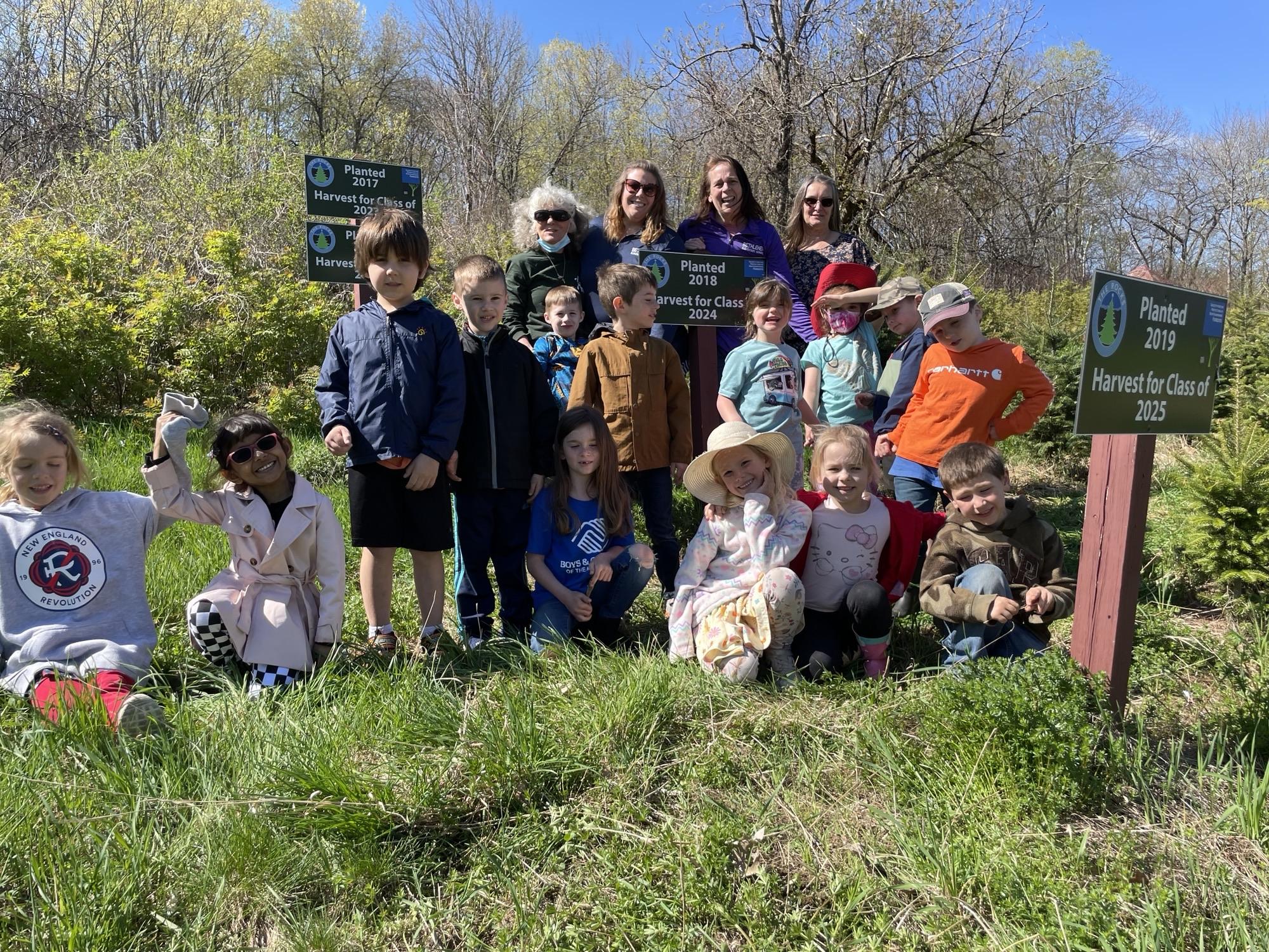 Bethlehem Elementary kindergarteners pose in the Forevergreen field where they planted their seedlings.