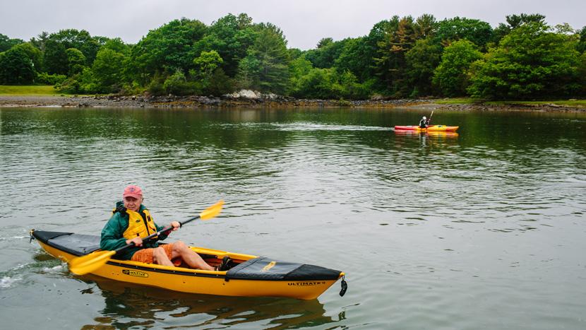Volunteers collect trash as part of a kayak clean up in the Seacoast