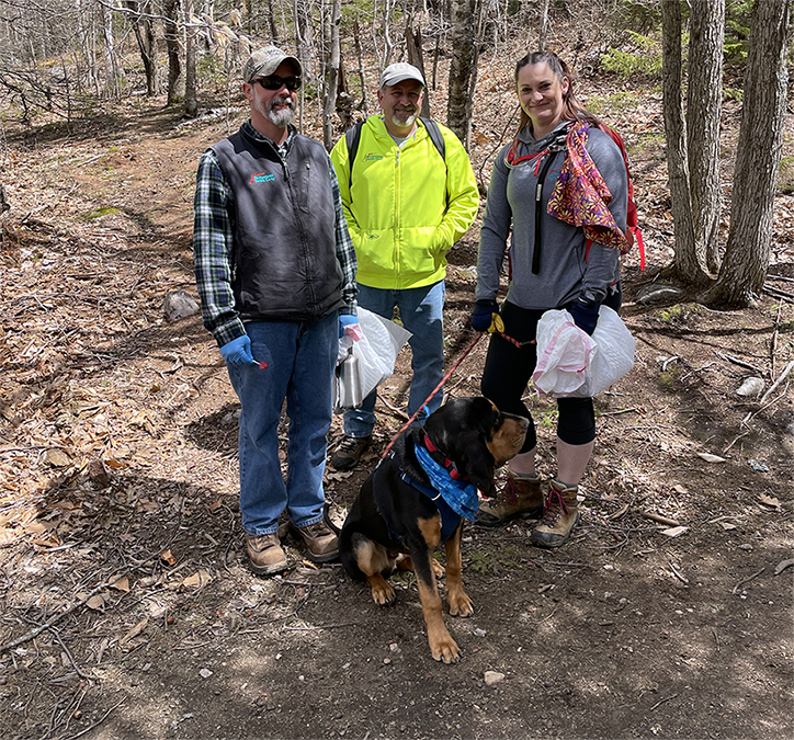 A team from NH Electric Cooperative stops on the trail for a photo.