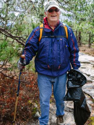   Volunteer Bill Young of Alton has been hiking Mount Major since he was a teenager. Last weekend was his first time at the annual clean up event.