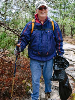   Volunteer Bill Young of Alton has been hiking Mount Major since he was a teenager. Last weekend was his first time at the annual clean up event.