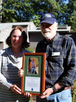 Dave Heuss and Carrie Deegan pose together with Dave's award.