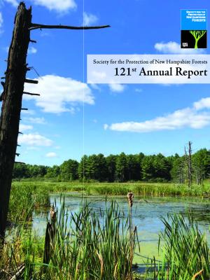 The cover of the Annual Report shows a pond at Champlin Forest.