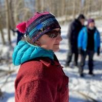 Forester Wendy Weisiger in sunglasses on timber harvest tour