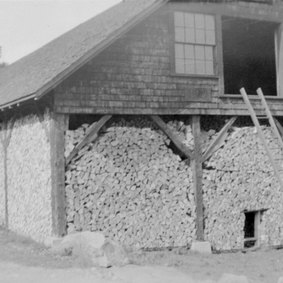 The woodshed full of wood.