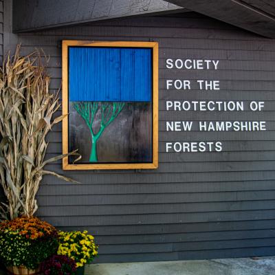 The SPNHF sign at the entrance to the Conservation Center.