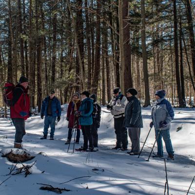Forest Society Senior Director of Education Dave Anderson led the group into the woods to explore the newly protected land. (Photo: Kate Wilcox)