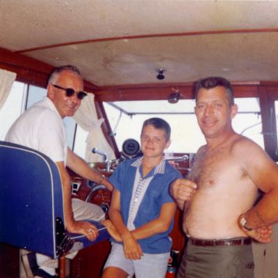 Barrett Dolph (far right) loved being on the water, despite his experience as a 19 year old during the Hurricane of 1938. 