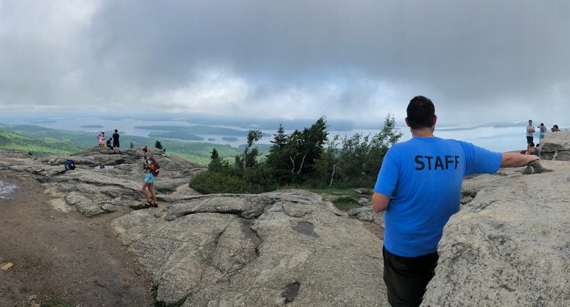 Soaking in the summit views at Mount Major in Alton New Hampshire