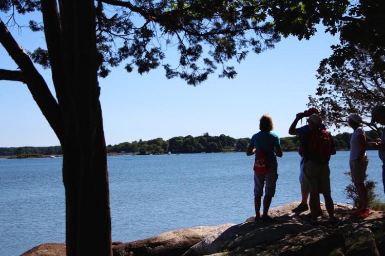 Visitors enjoy the view of Little Harbor in Portsmouth from the Forest Society's Creek Farm Reservation