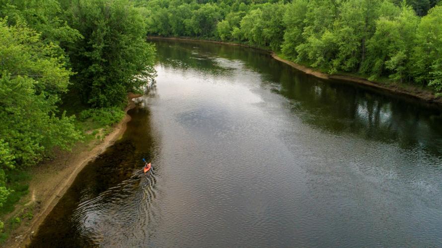 A birds-eye view of the Merrimack River meandering next to Stillhouse Forest.
